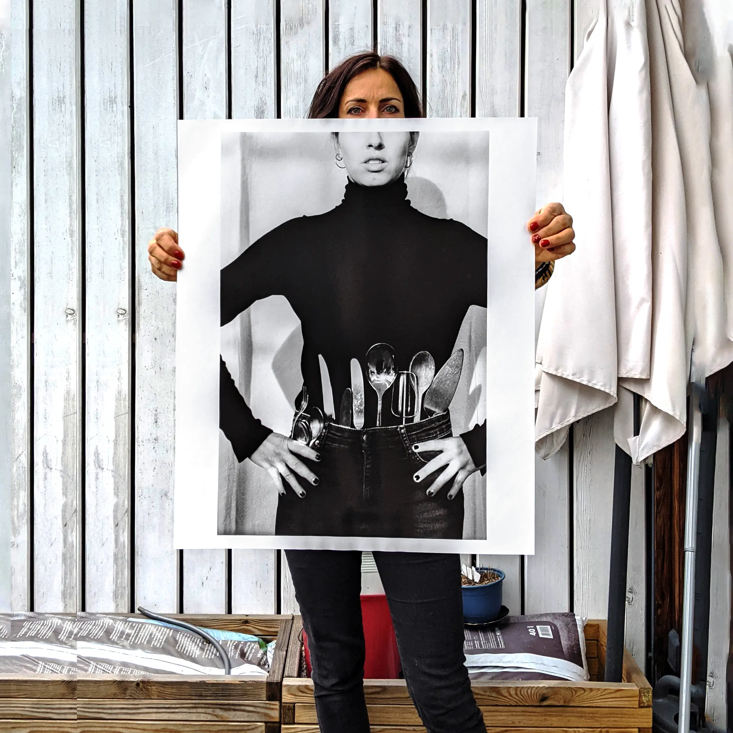 Image of person holding a poster