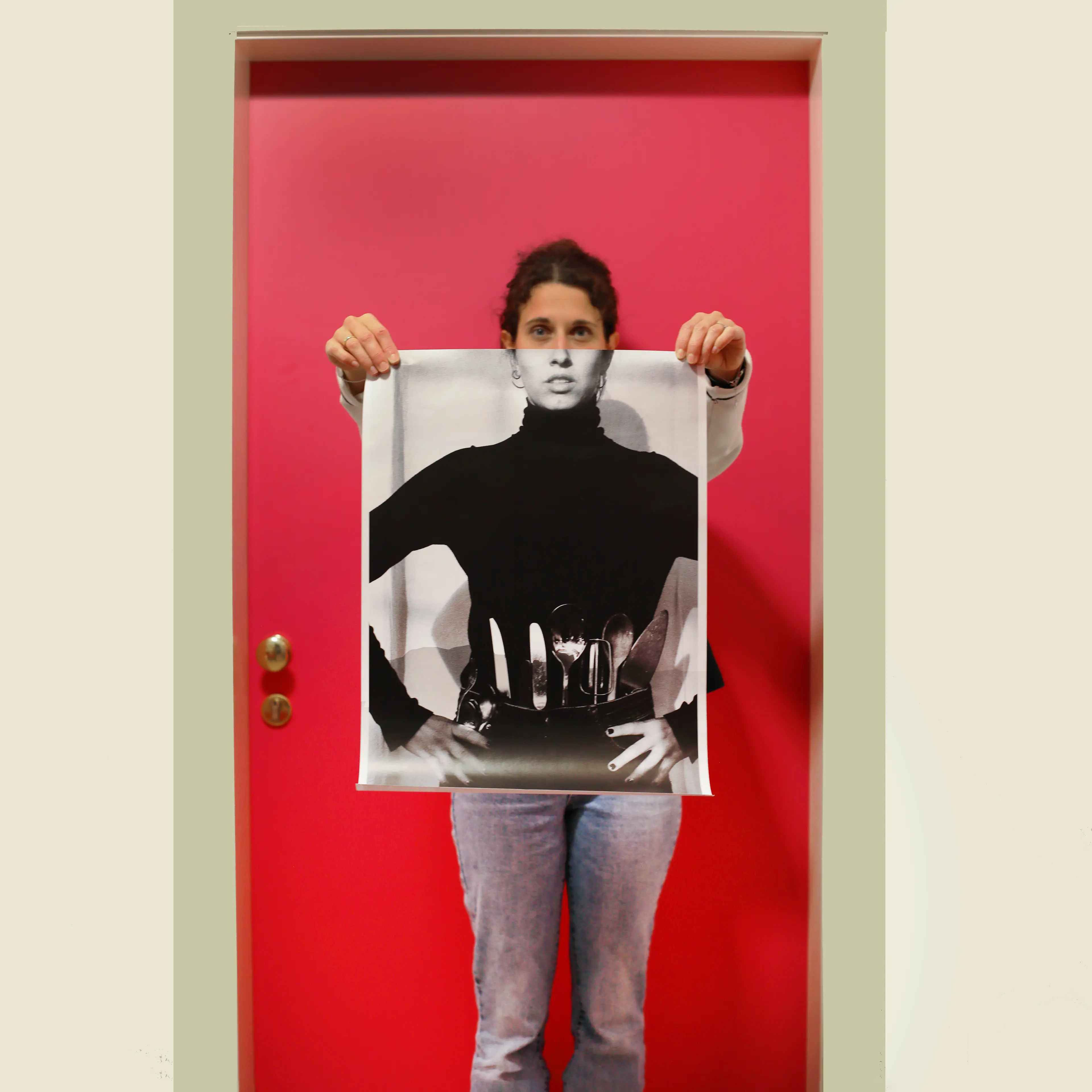 Image of person holding a poster