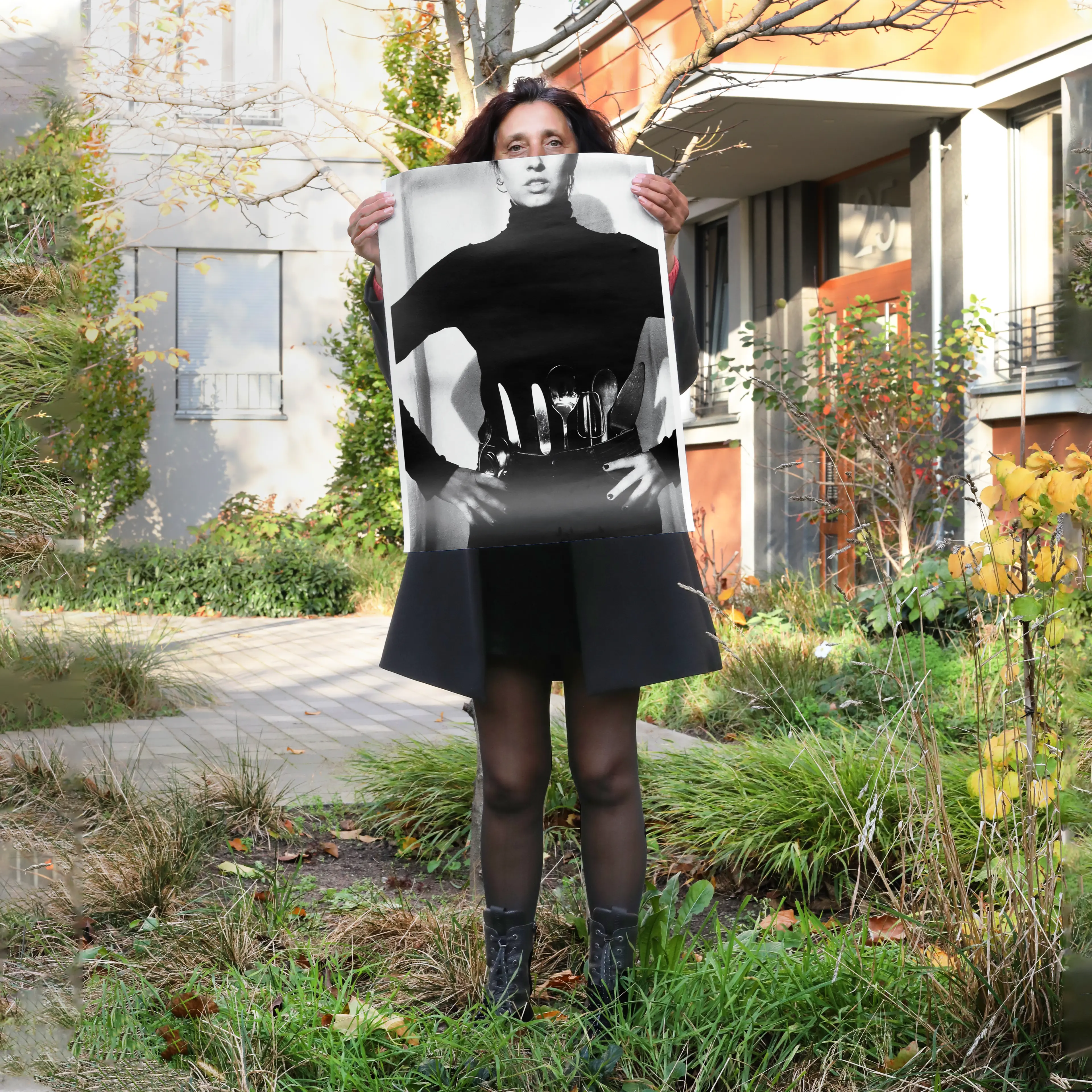 Image of person holding a poster