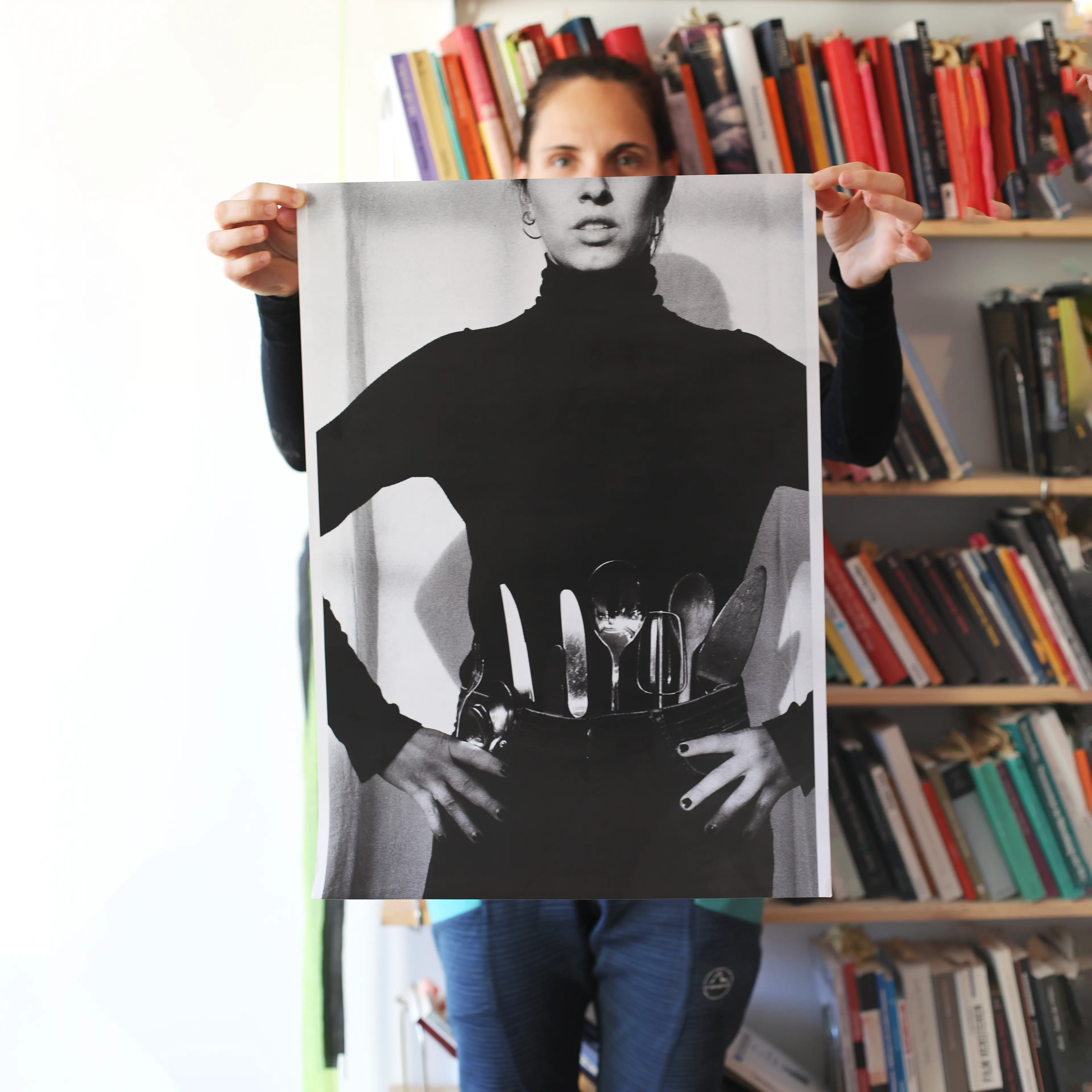 Image of person holding a poster