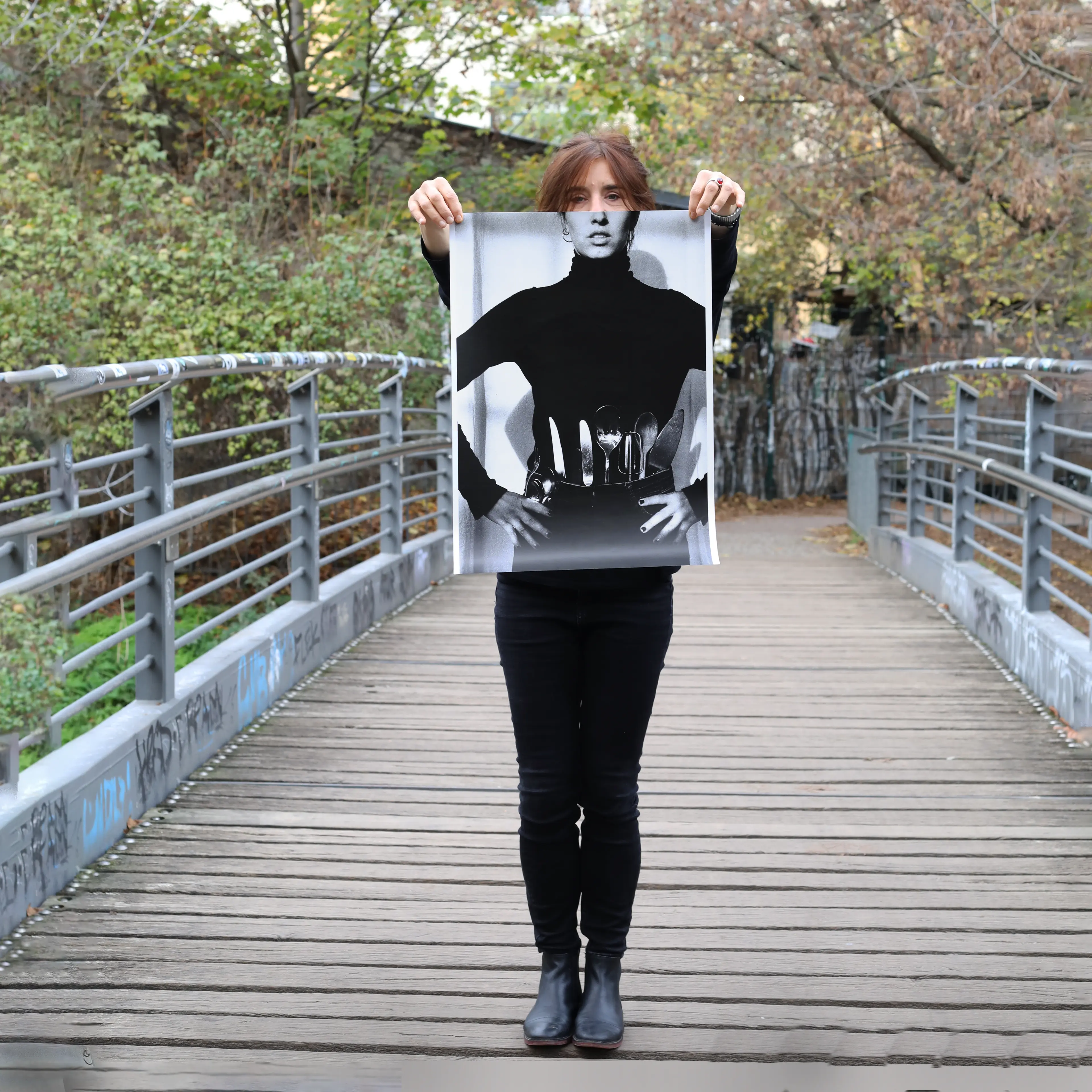 Image of person holding a poster