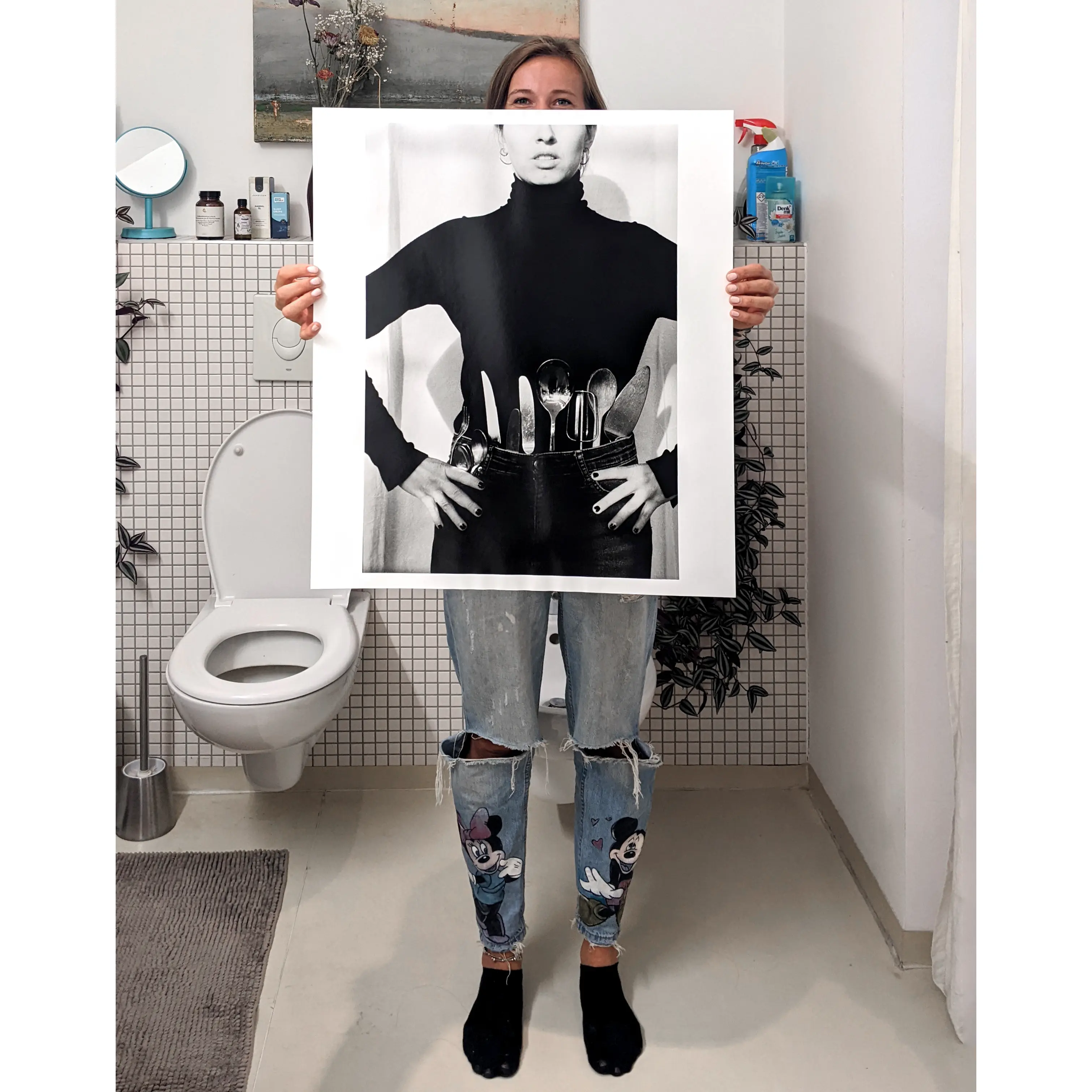 Image of person holding a poster