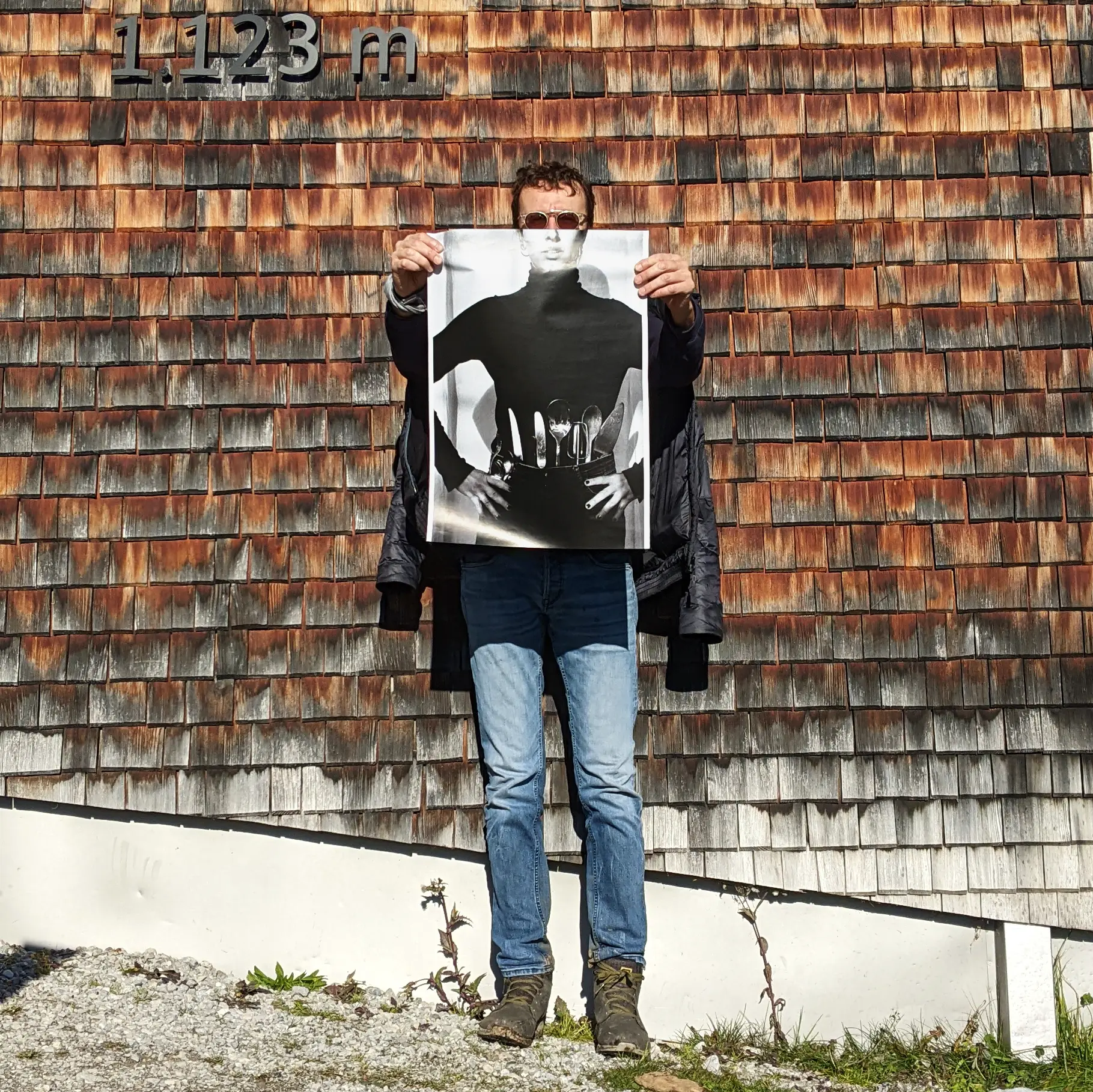Image of person holding a poster