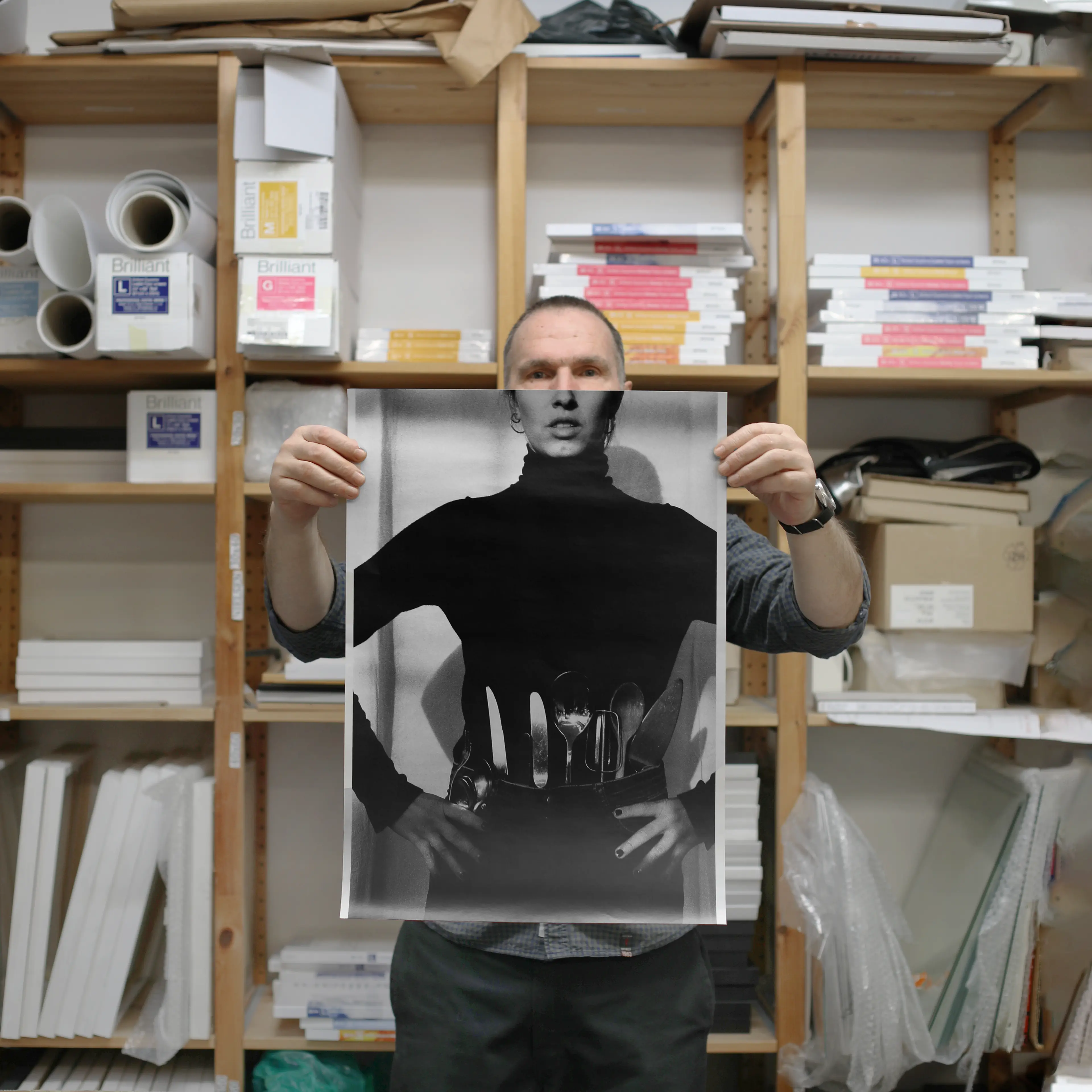 Image of person holding a poster